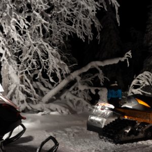 Snowmobiles at Night